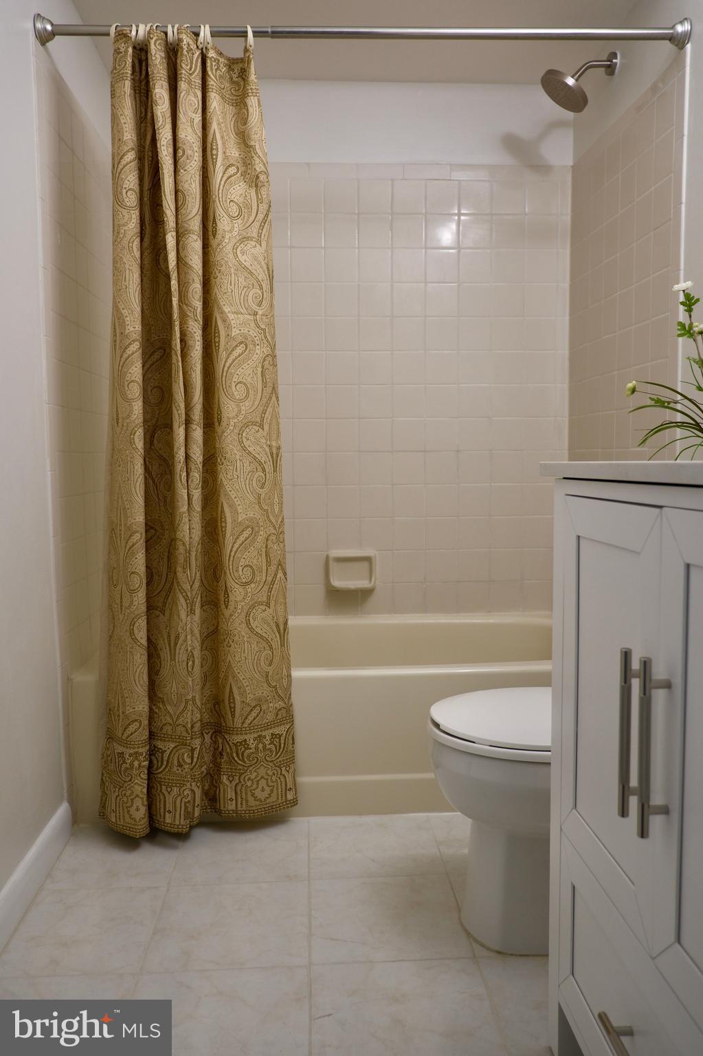 307 Trinity Court, Unit 4 Princeton, NJ 08540 - Photo 27 of 39 a bathroom with a toilet and a shower