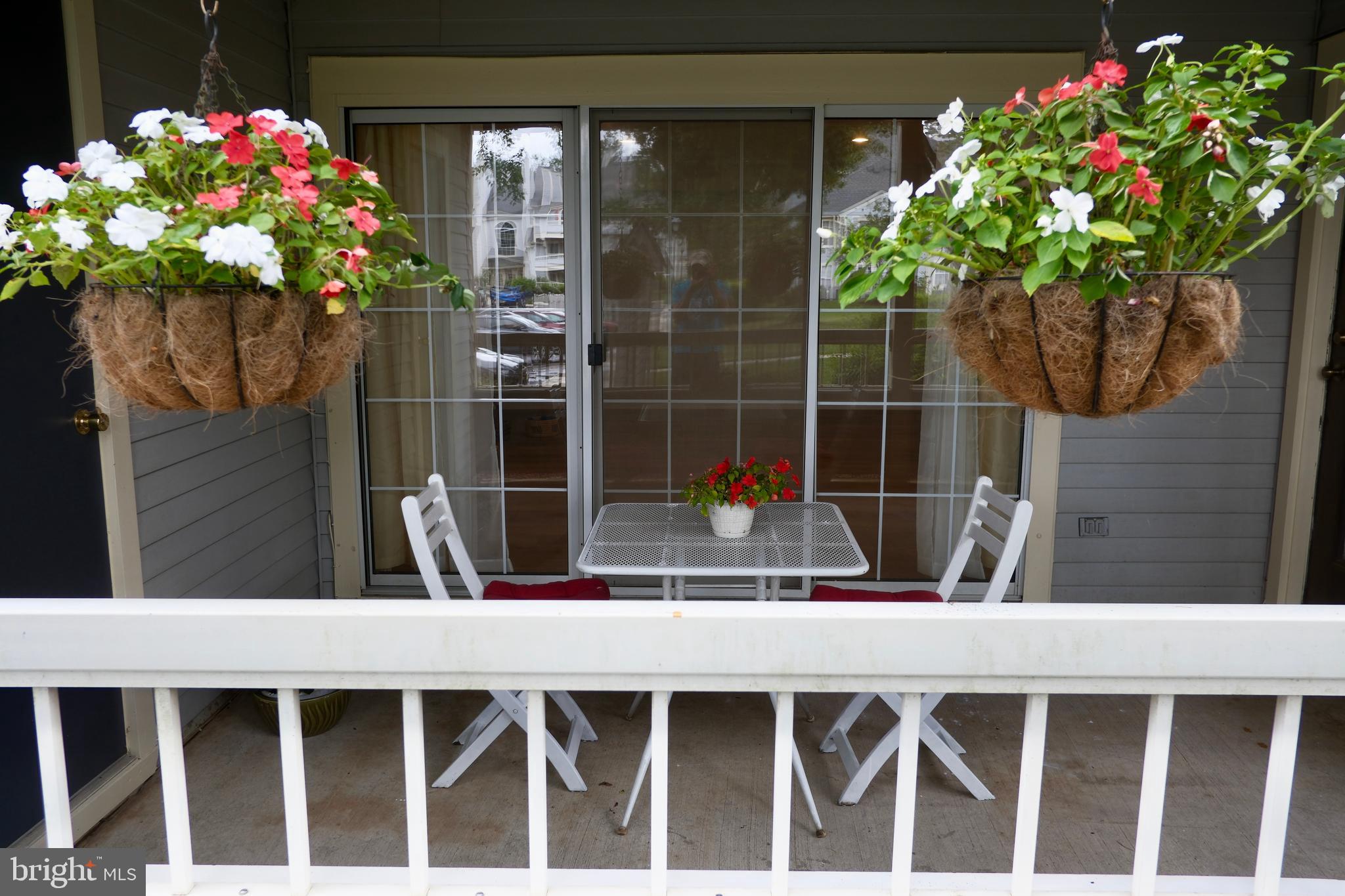 307 Trinity Court, Unit 4 Princeton, NJ 08540 - Photo 30 of 39 a view of a house with a flower garden