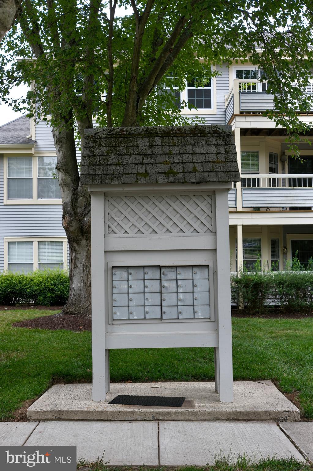 307 Trinity Court, Unit 4 Princeton, NJ 08540 - Photo 39 of 39 a front view of a house with a yard