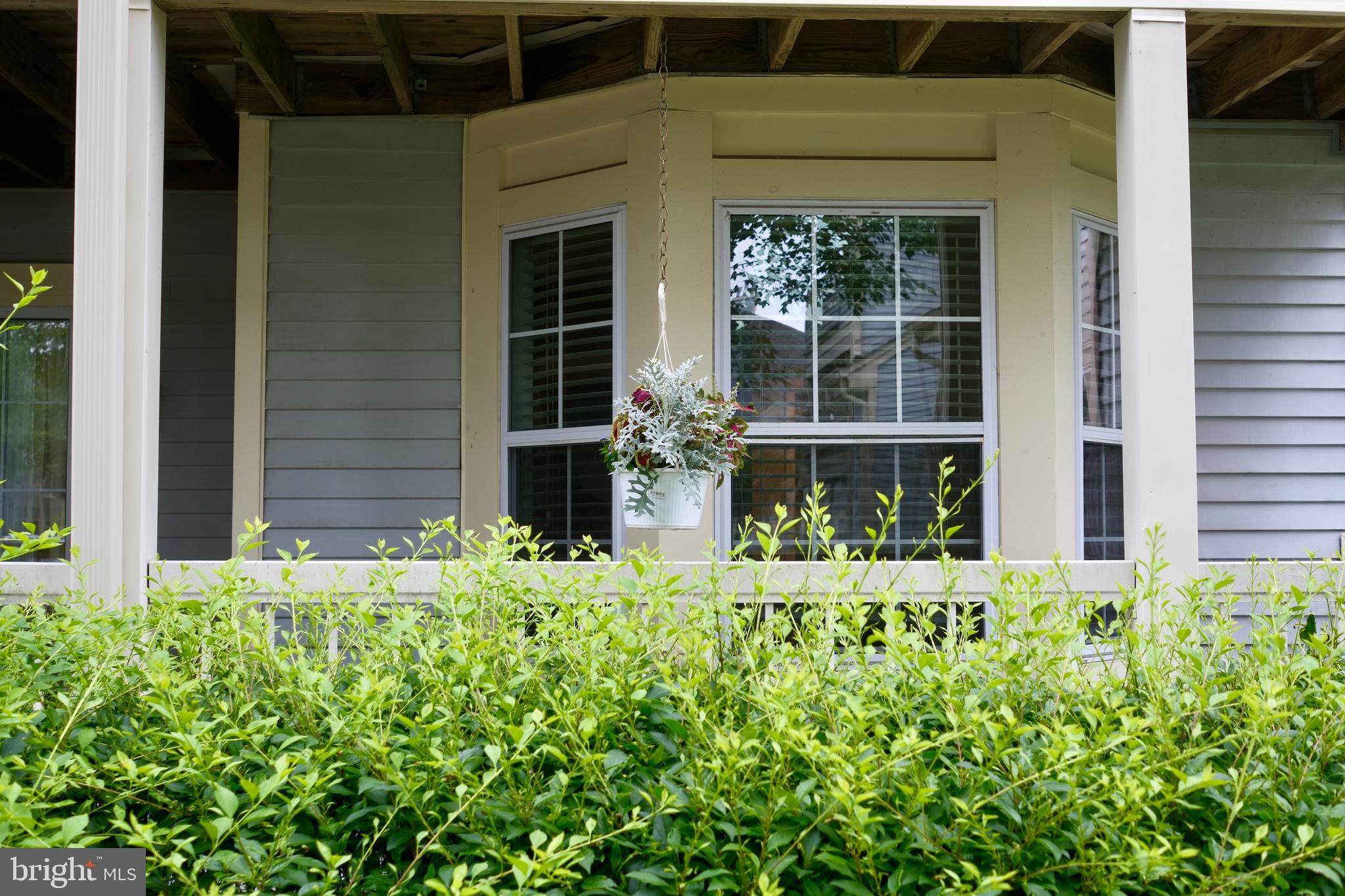 307 Trinity Court, Unit 4 Princeton, NJ 08540 - Photo 4 of 39 a flower garden in front of a house