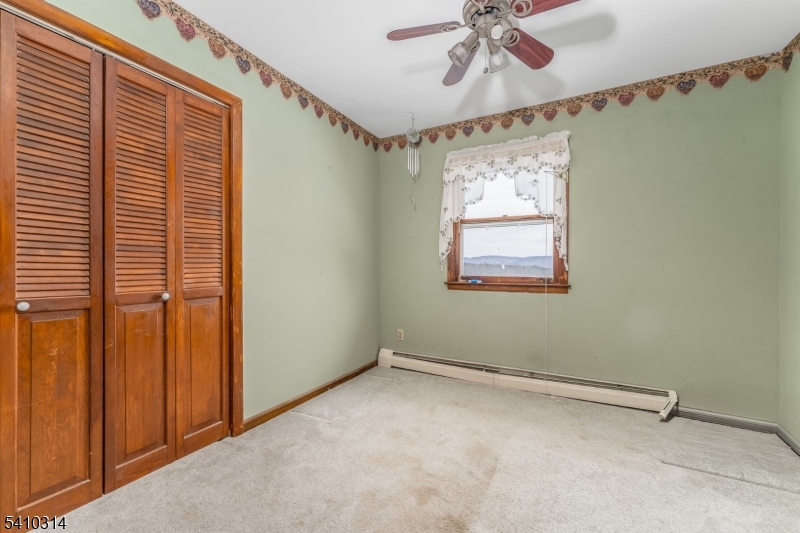 252 Mountain View Road West Asbury, NJ 08802 - Photo 13 of 28 a view of an empty room with a window