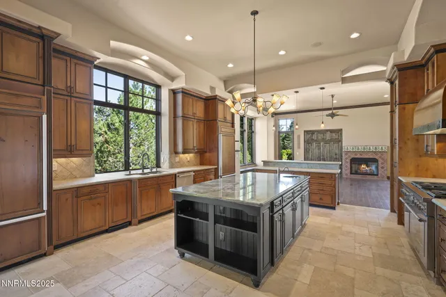 a stove top oven sitting inside of a kitchen