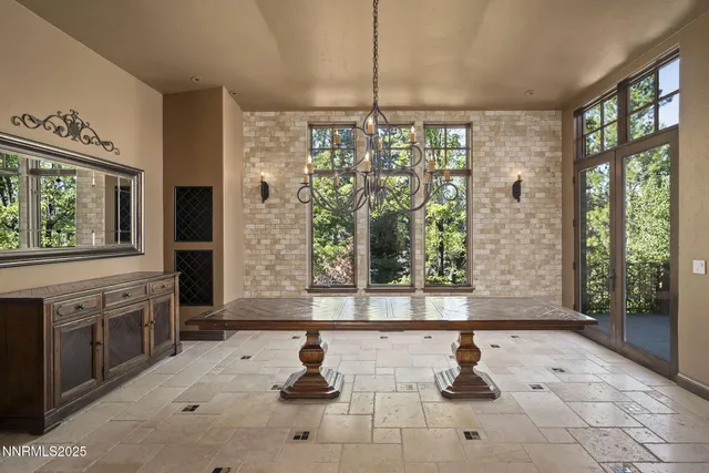 a bathroom with bathtub and window