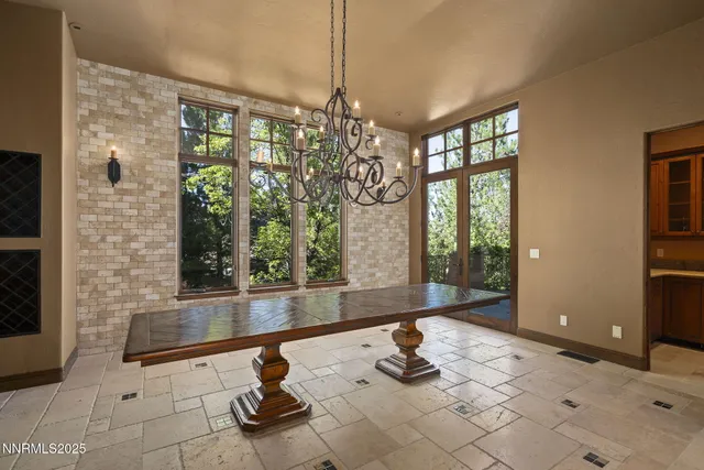 a bathroom with a shower and a glass door