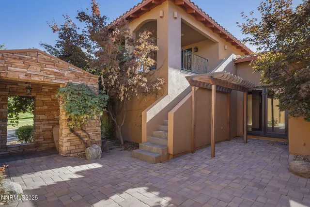 a view of a backyard of the house