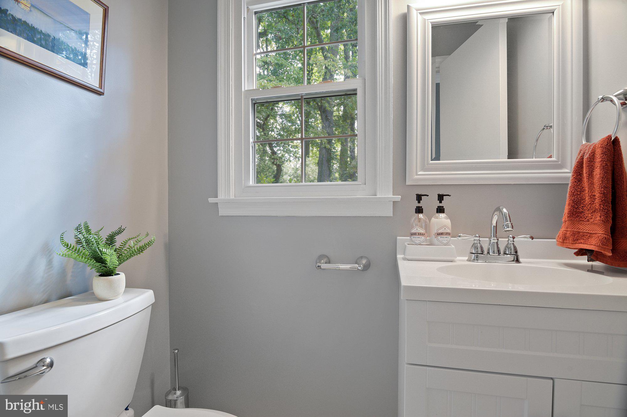 13907 Foxland Road Phoenix, MD 21131 - Photo 17 of 48 Main level powder room located off family room