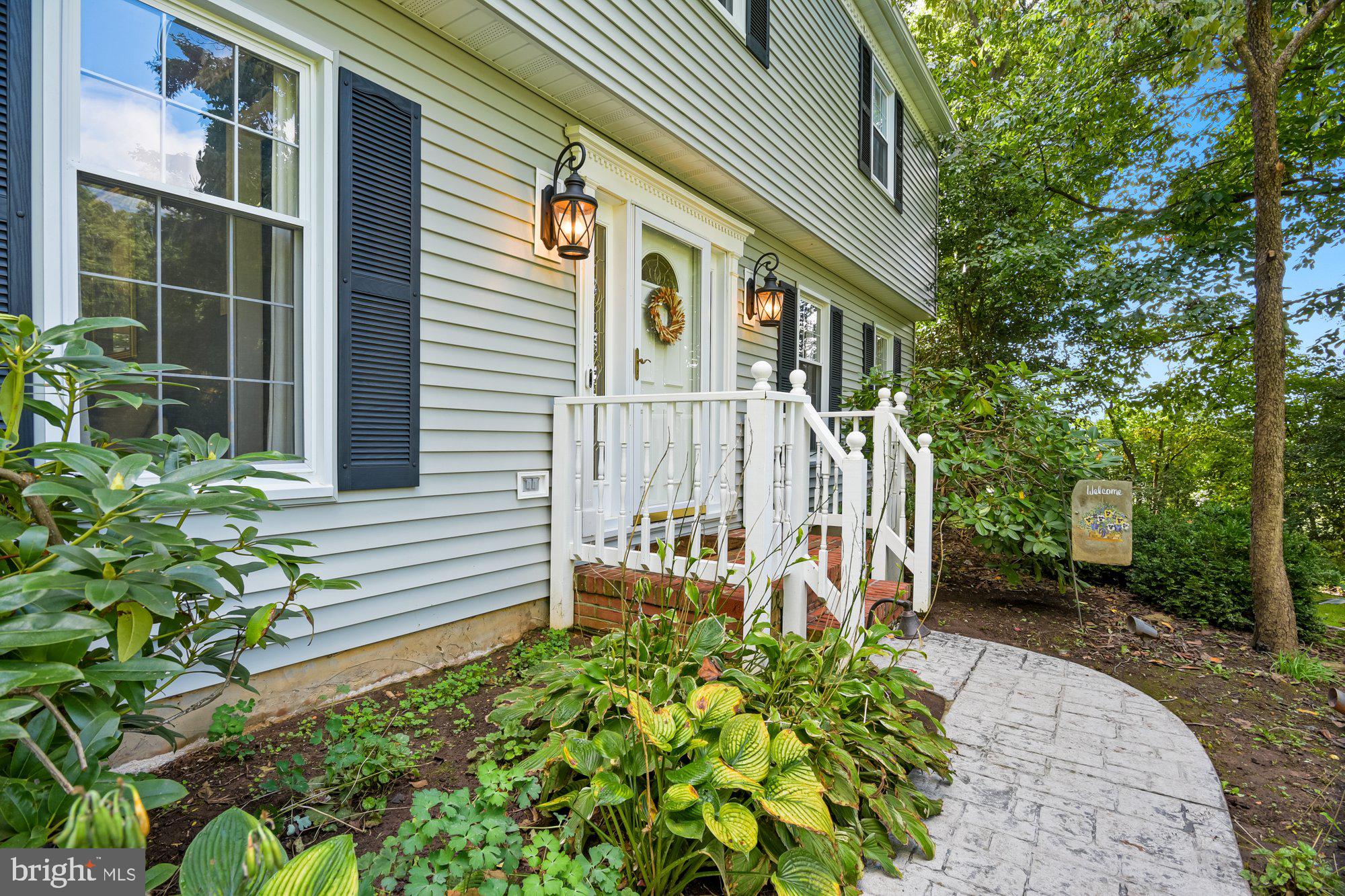 13907 Foxland Road Phoenix, MD 21131 - Photo 26 of 48 The stamped concrete walkway welcomes you home