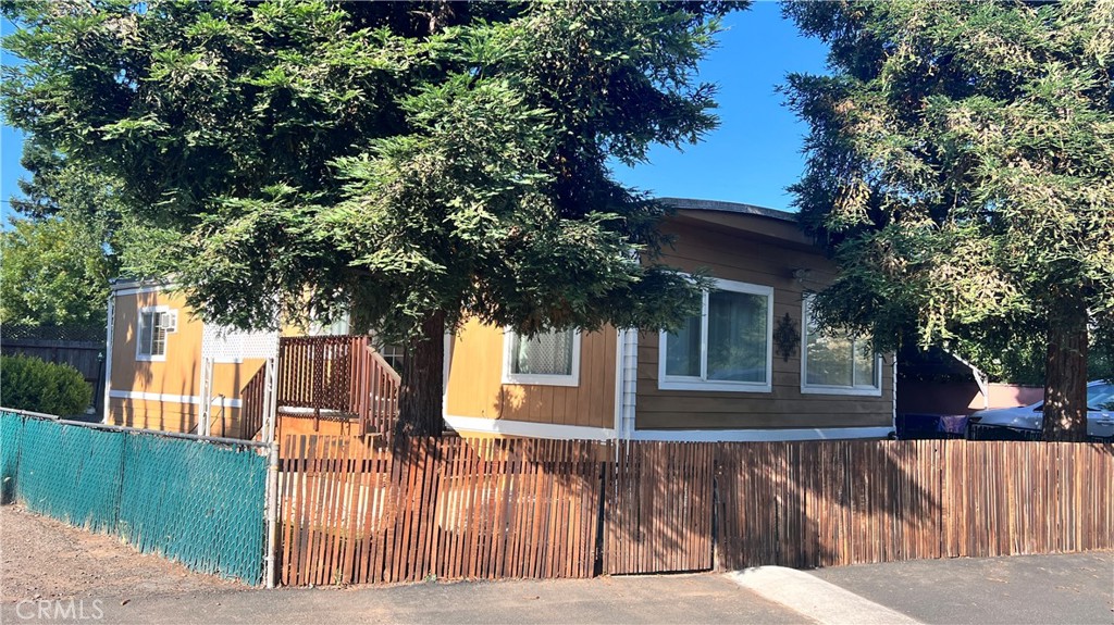 2135 Nord Avenue, Unit 33 Chico, CA 95926 - Photo 17 of 35 a view of a house with a yard
