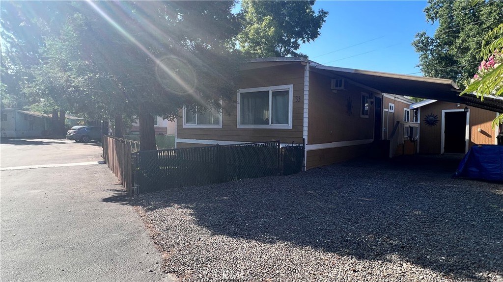 2135 Nord Avenue, Unit 33 Chico, CA 95926 - Photo 24 of 35 a view of a house with a yard