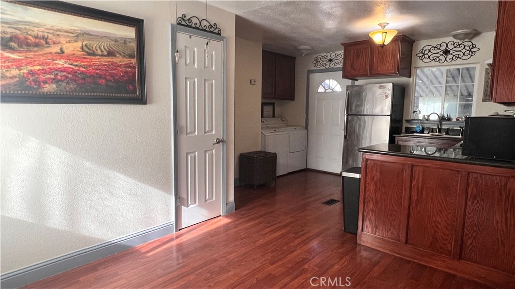 2135 Nord Avenue, Unit 33 Chico, CA 95926 - Photo 3 of 35 a kitchen with stainless steel appliances granite countertop a refrigerator and a stove