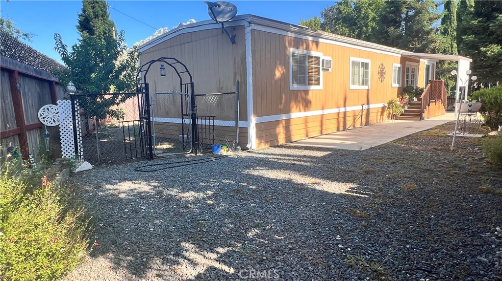 2135 Nord Avenue, Unit 33 Chico, CA 95926 - Photo 33 of 35 a front view of a house with a yard