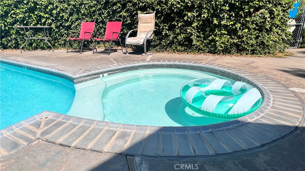 2135 Nord Avenue, Unit 33 Chico, CA 95926 - Photo 35 of 35 a view of a wooden floor with a bench