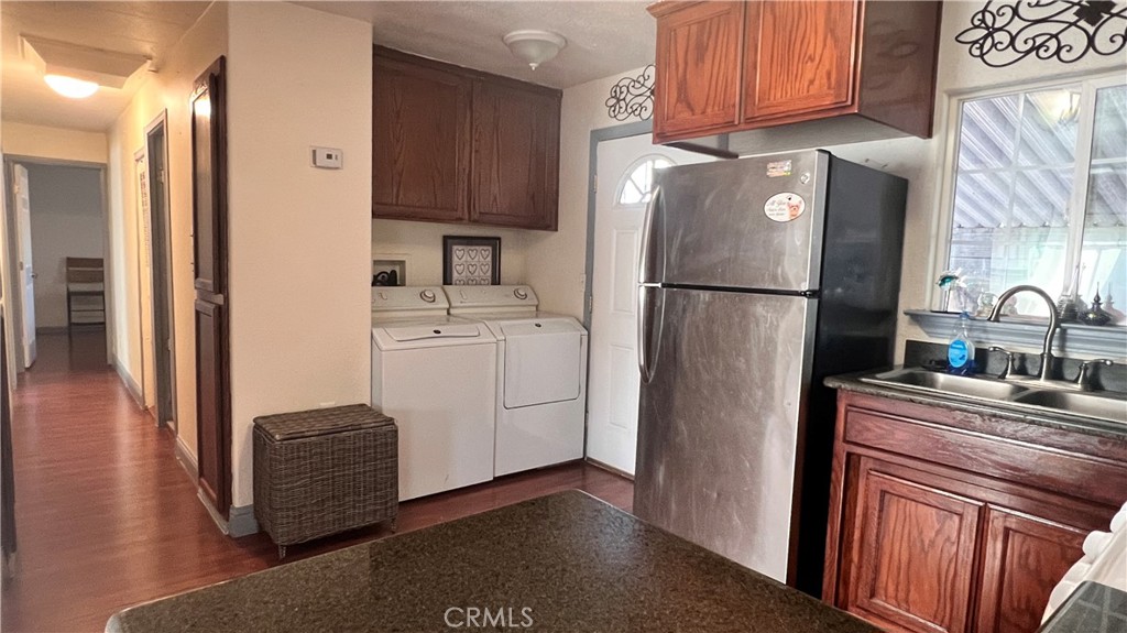 2135 Nord Avenue, Unit 33 Chico, CA 95926 - Photo 7 of 35 a white refrigerator freezer sitting in a kitchen