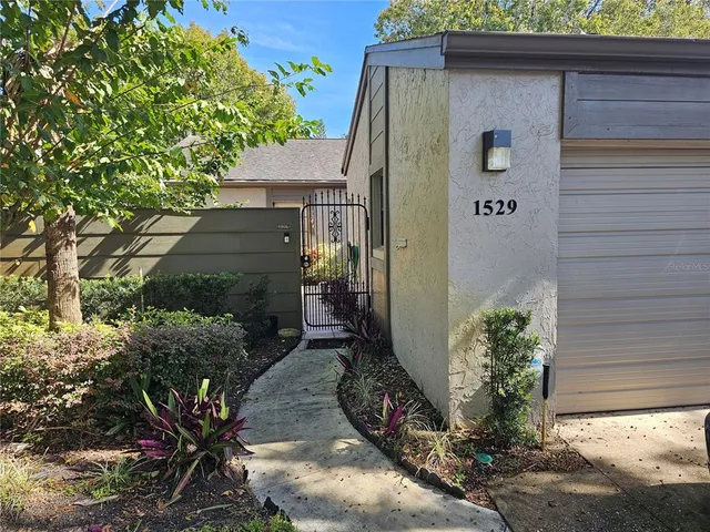 a view of a back yard of the house