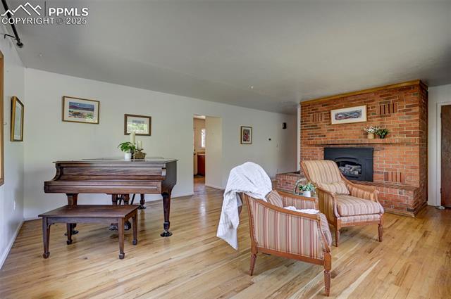 4665 Fox Road Cascade, CO 80809 - Photo 9 of 50 Rich hardwood floors grace most of the main level of this beautiful home.
