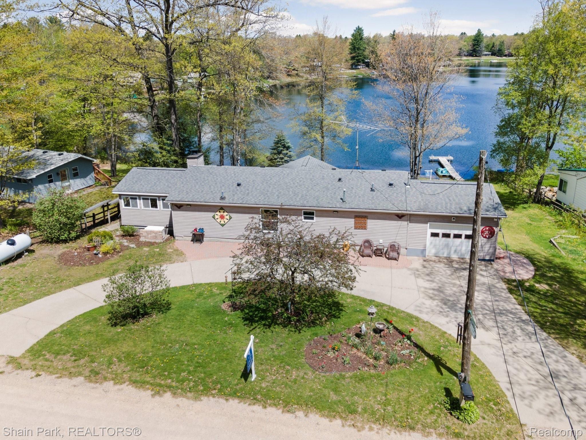 301 Shappell Road Harrison, MI 48625 - Photo 1 of 53 The Cottage on Bluegill Lake