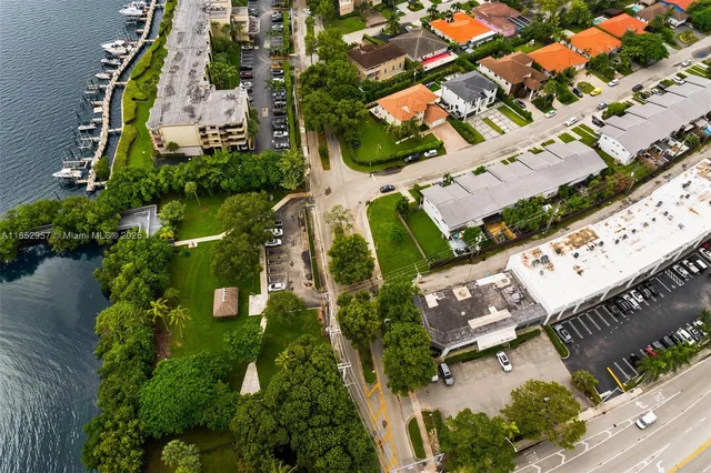 an aerial view of a city and lake view