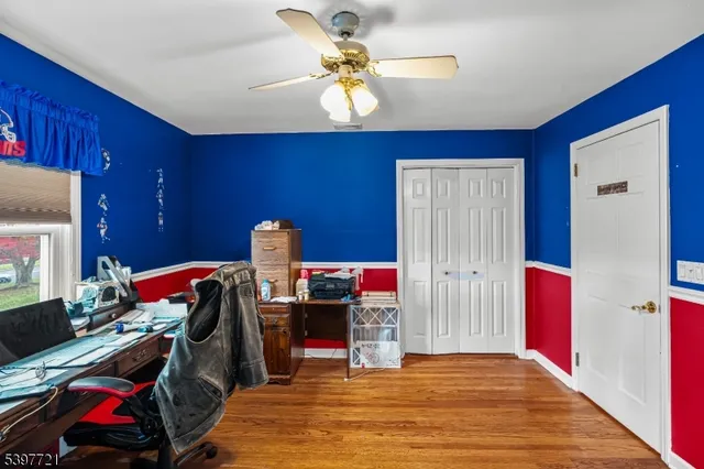 a workspace with furniture and screen