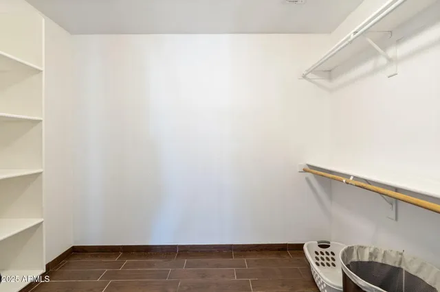 a view of a room with rack on the wall