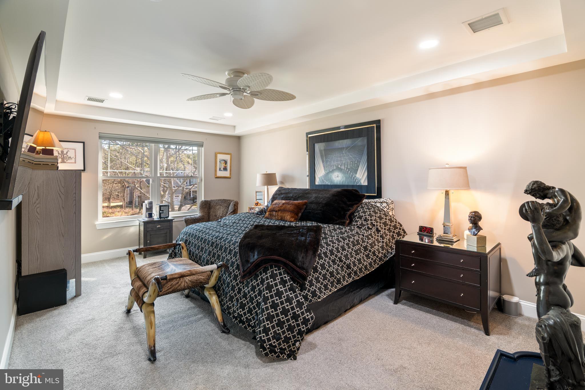 98 Alexander Drive Barnegat, NJ 08005 - Photo 44 of 60 a bedroom with furniture and a large window