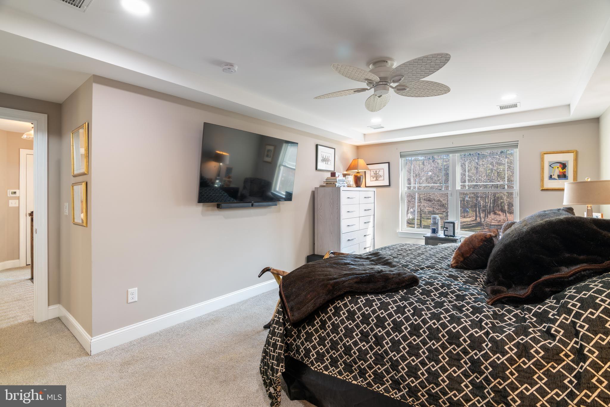 98 Alexander Drive Barnegat, NJ 08005 - Photo 45 of 60 a bedroom with a bed window and a flat screen tv