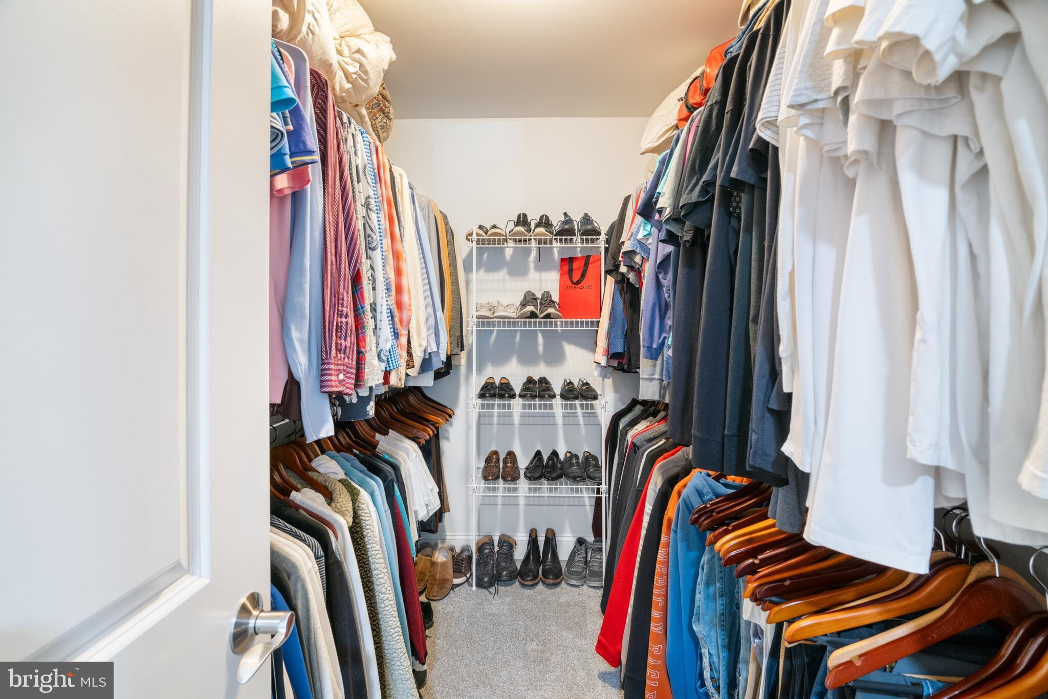 98 Alexander Drive Barnegat, NJ 08005 - Photo 50 of 60 a view of walk in closet with clothes