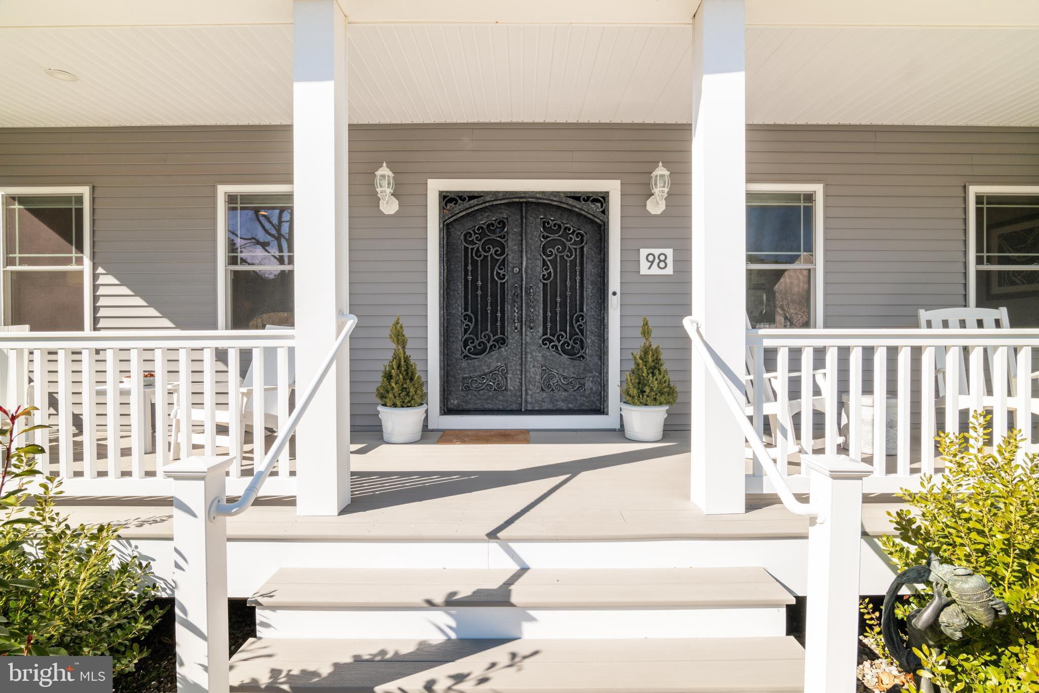 98 Alexander Drive Barnegat, NJ 08005 - Photo 6 of 60 a front view of a house with a garden
