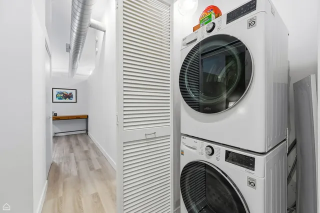 a utility room with dryer and washer