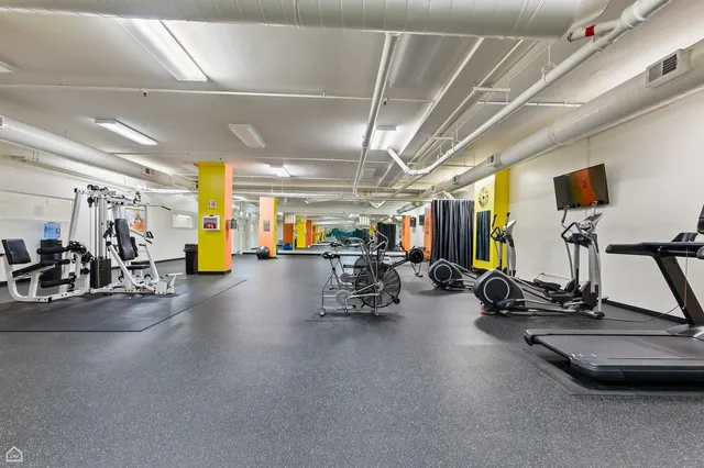 a view of a room with gym equipment