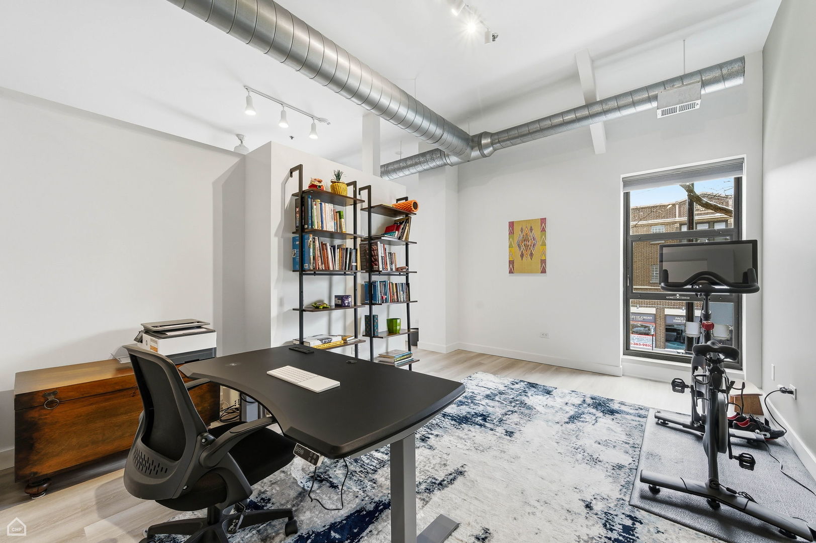 1000 East 53rd Street, Unit 215 Chicago, IL 60615 - Photo 8 of 17 a view of a workspace with furniture