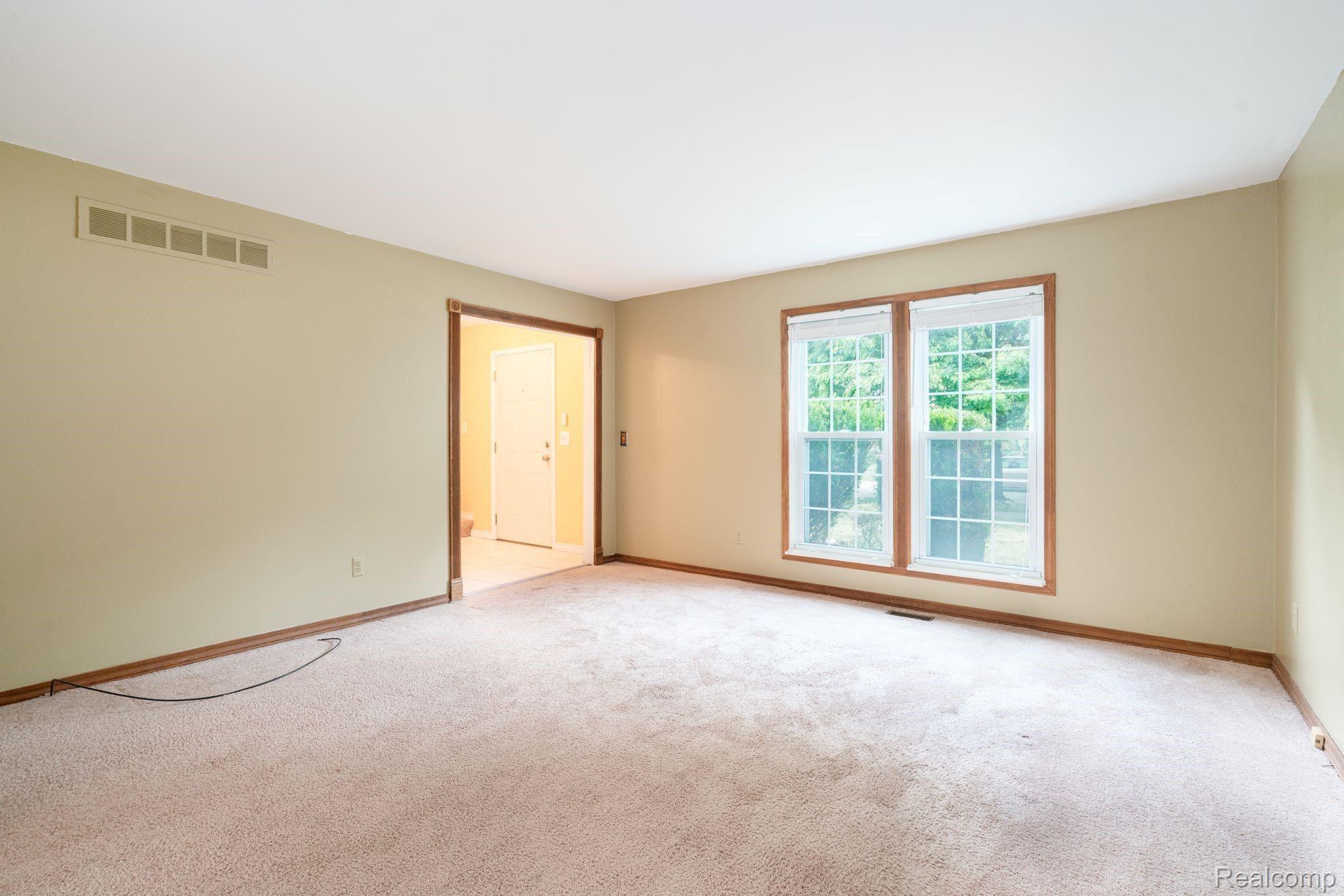 645 Worthington Road Canton, MI 48188 - Photo 9 of 30 Living Room with view of Foyer