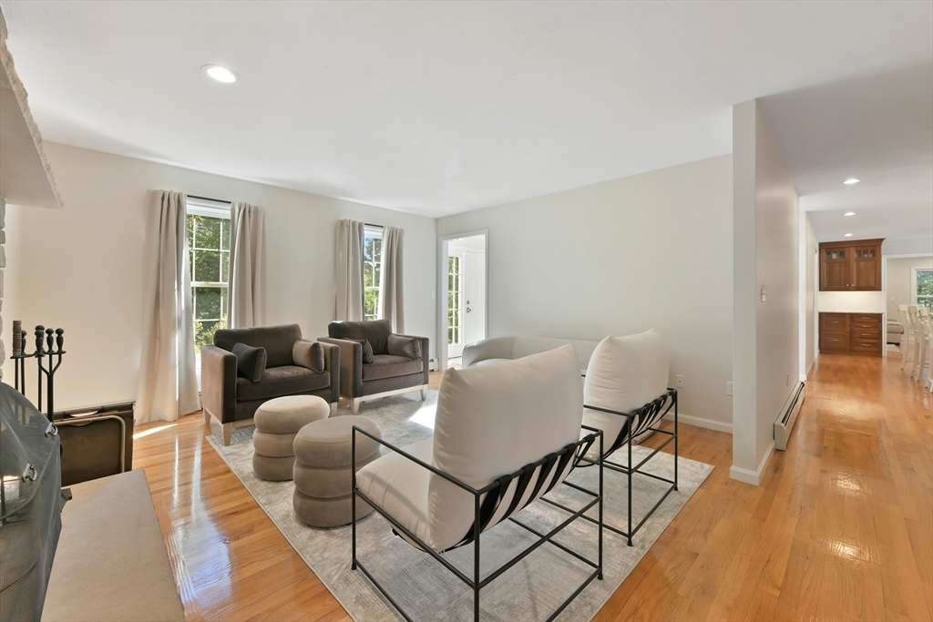 34 Valley Road Boxford, MA 01921 - Photo 14 of 42 a living room with furniture and a table