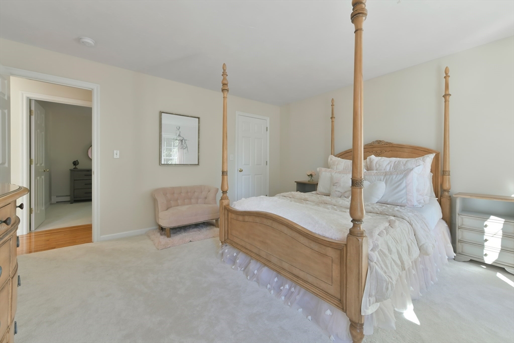 34 Valley Road Boxford, MA 01921 - Photo 21 of 42 a bedroom with a bed and a walk in closet