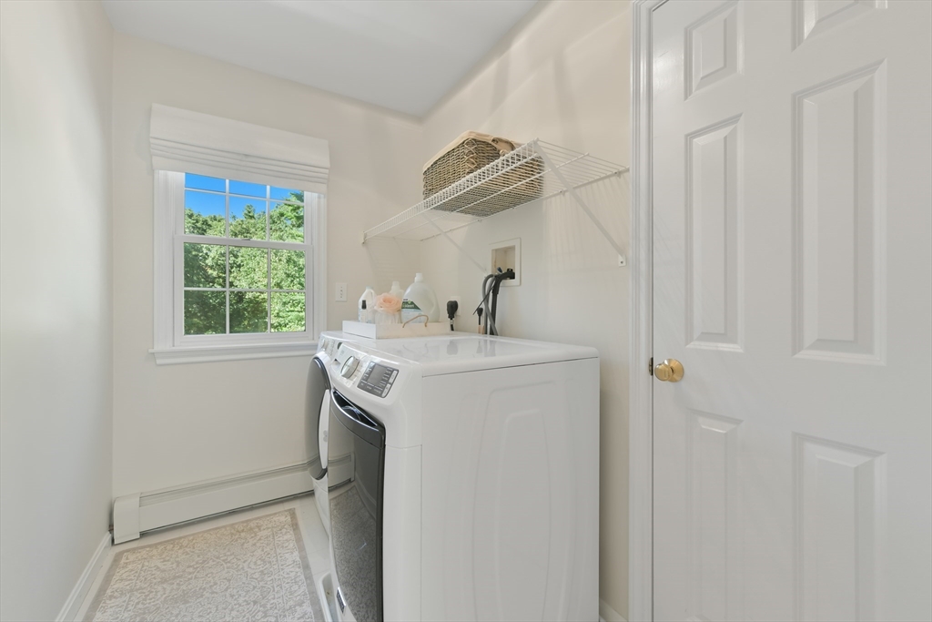 34 Valley Road Boxford, MA 01921 - Photo 23 of 42 a bathroom with a sink and a mirror