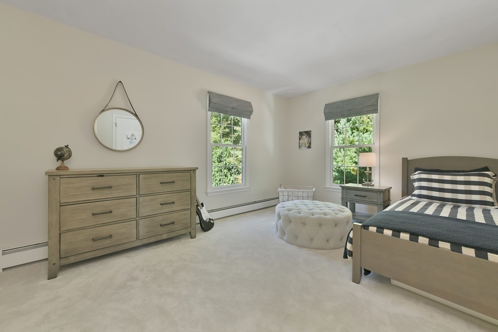 34 Valley Road Boxford, MA 01921 - Photo 24 of 42 a living room with furniture and a window