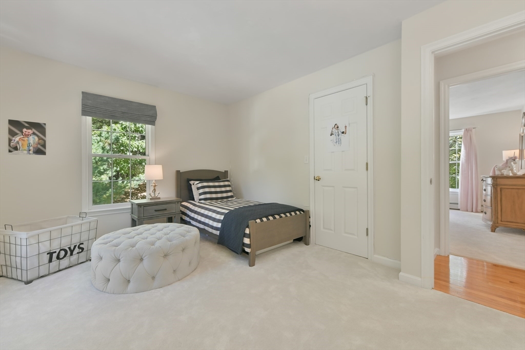 34 Valley Road Boxford, MA 01921 - Photo 25 of 42 a bedroom with a bed and a couch