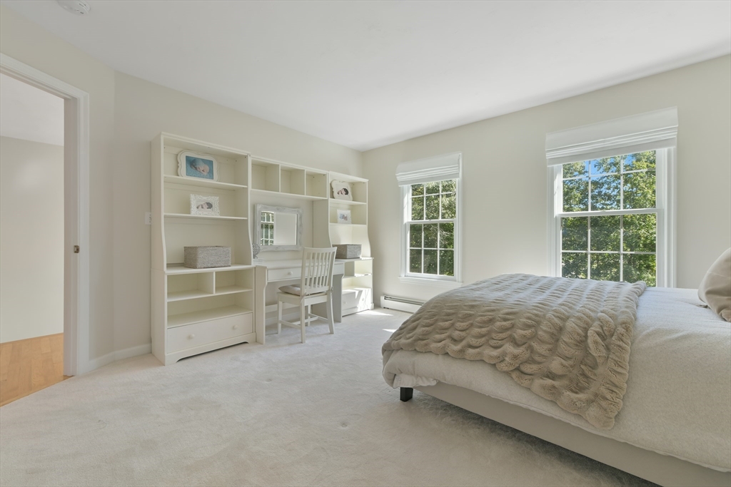 34 Valley Road Boxford, MA 01921 - Photo 27 of 42 a spacious bedroom with a bed and closet