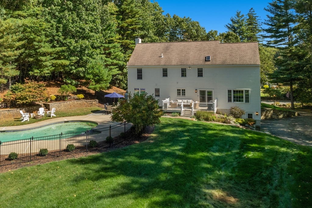34 Valley Road Boxford, MA 01921 - Photo 37 of 42 a aerial view of a house with a yard porch and sitting area