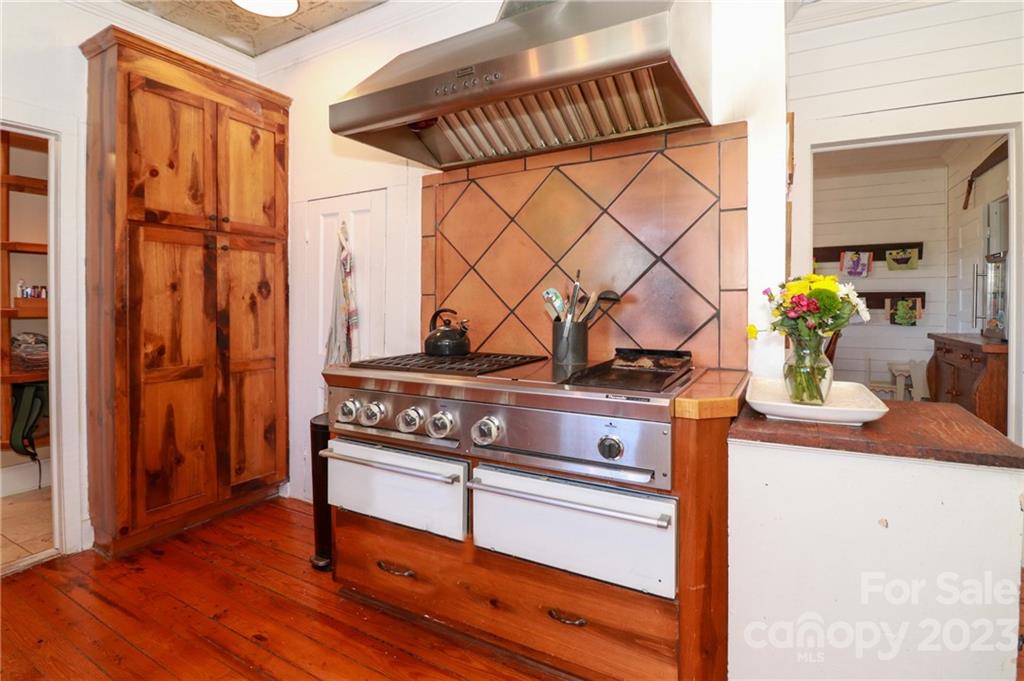 8689 Math Road Stanfield, NC 28163 - Photo 14 of 36 a view of hallway with wooden floor