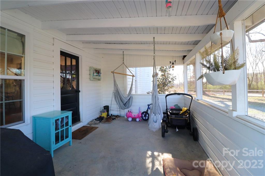 8689 Math Road Stanfield, NC 28163 - Photo 24 of 36 a room with furniture and a window