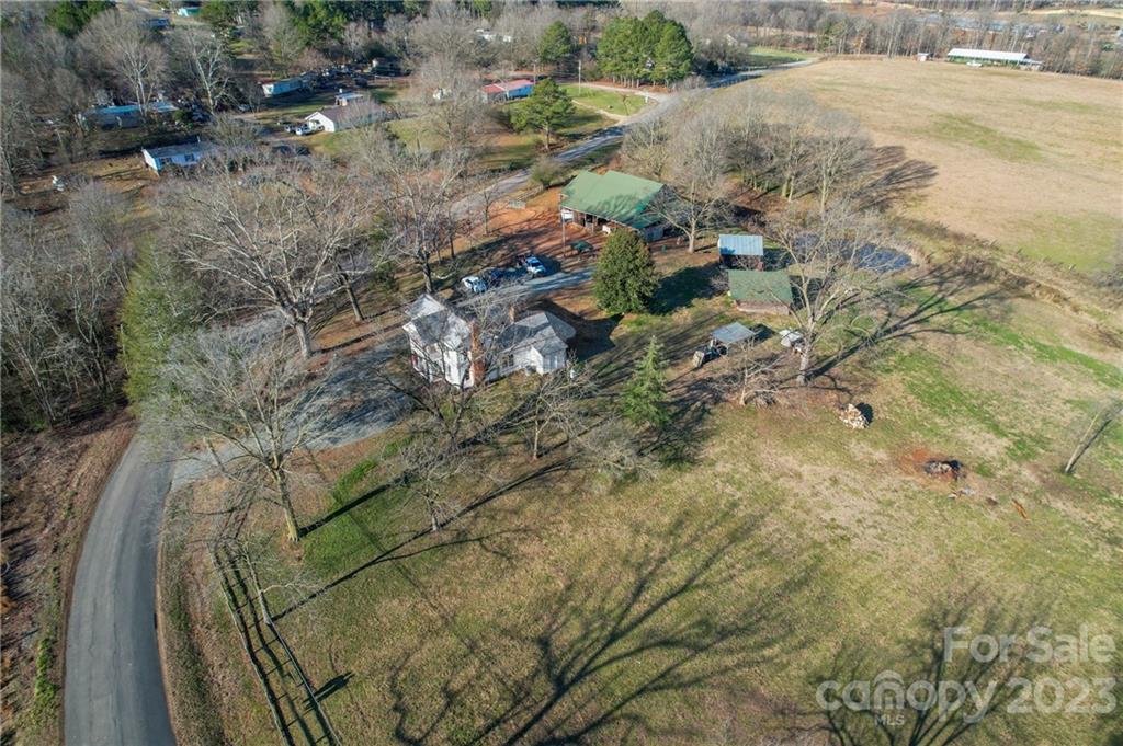 8689 Math Road Stanfield, NC 28163 - Photo 4 of 36 a view of a yard