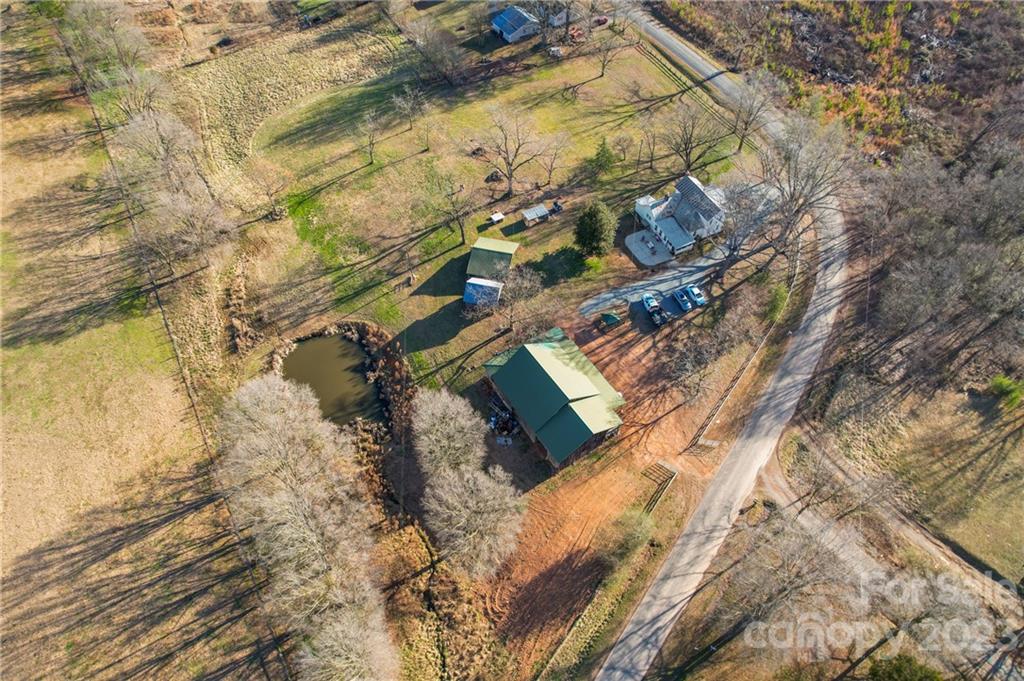 8689 Math Road Stanfield, NC 28163 - Photo 5 of 36 view of a house with a yard