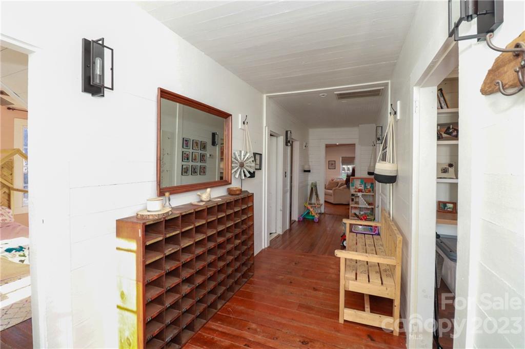 8689 Math Road Stanfield, NC 28163 - Photo 6 of 36 a view of a bedroom with wooden floor