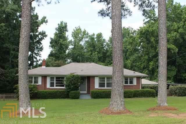 4770 Atlanta Highway Rutledge, GA 30663 - Photo 1 of 1 a front view of a house with garden