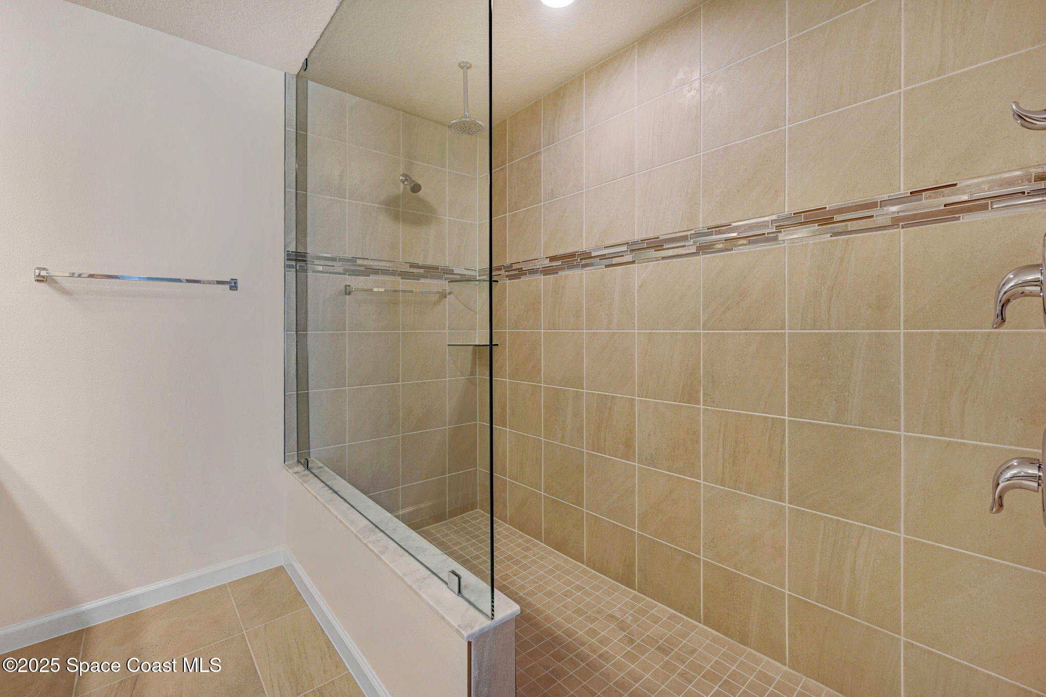1089 Savery Road Palm Bay, FL 32908 - Photo 36 of 47 a bathroom with a shower