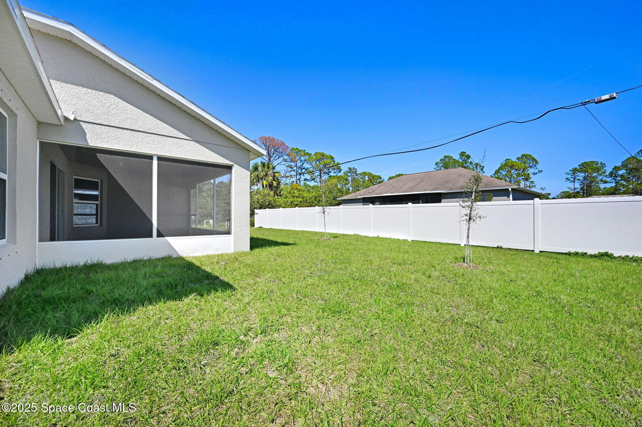 1089 Savery Road Palm Bay, FL 32908 - Photo 44 of 47 a view of a backyard