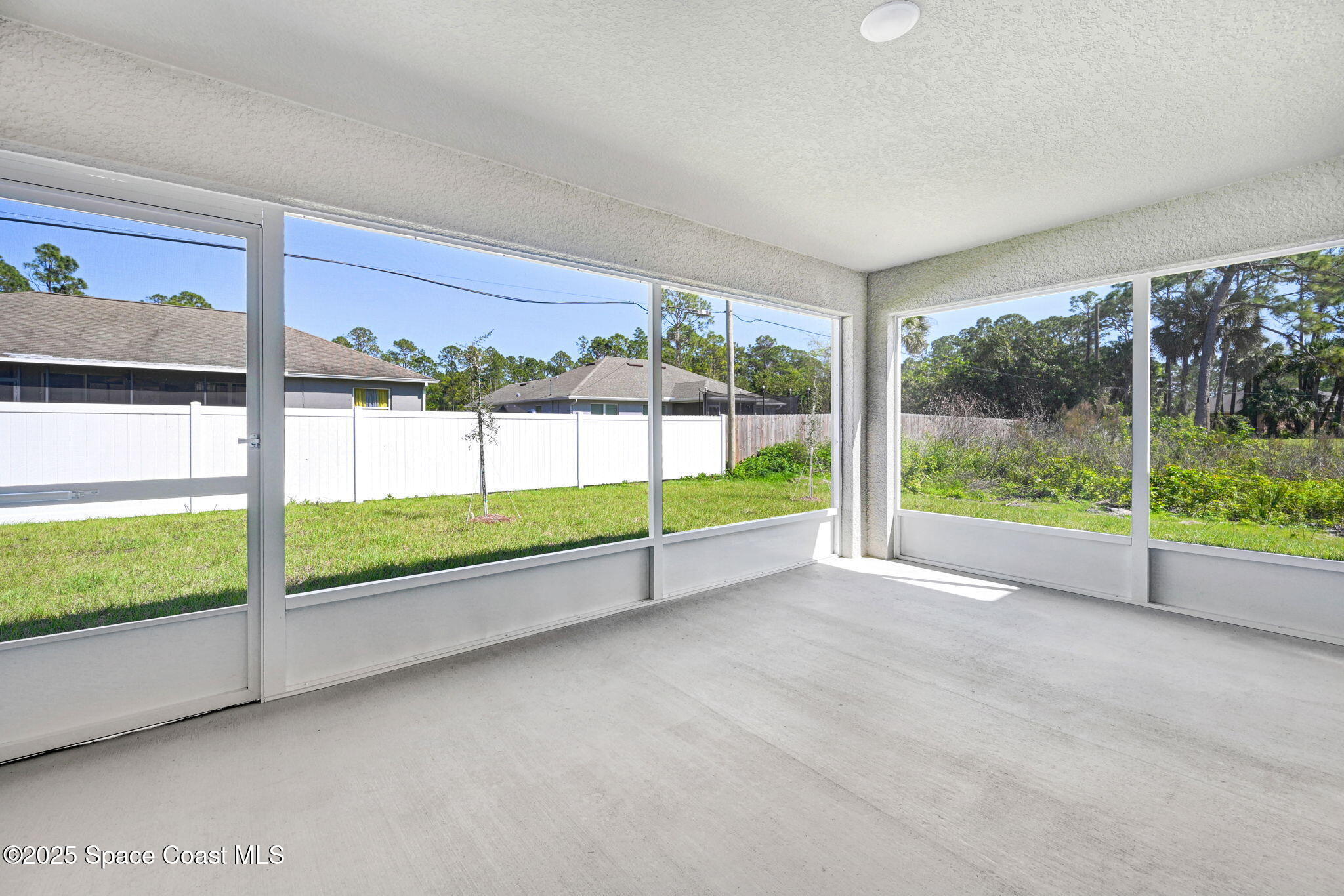 1089 Savery Road Palm Bay, FL 32908 - Photo 6 of 47 a view of a garden with an outdoor seating
