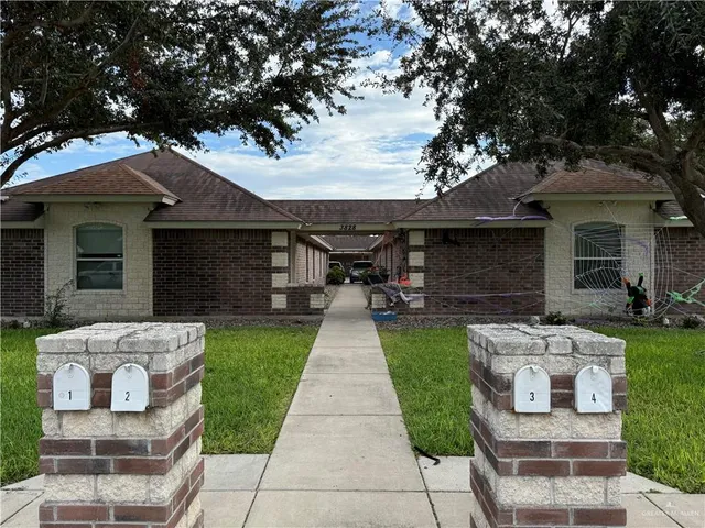 a front view of a house with patio