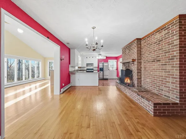 a view of wooden floor and a window