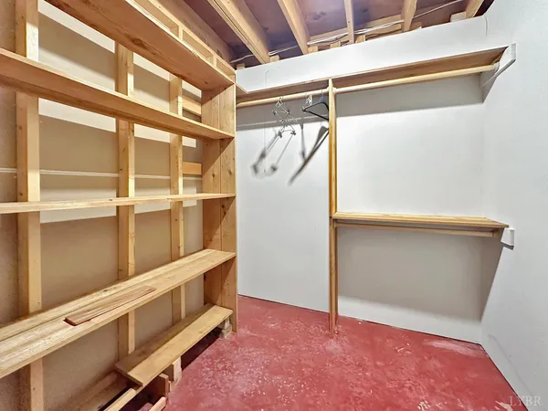a view of a brick house with a large window